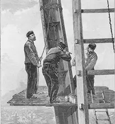 Стоян Самоука- човекът с брадата - на работна платформа под върха на Айфеловата кула.