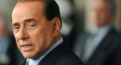 Самоубиец "завеща" жена си и детето си на грижите на Берлускони