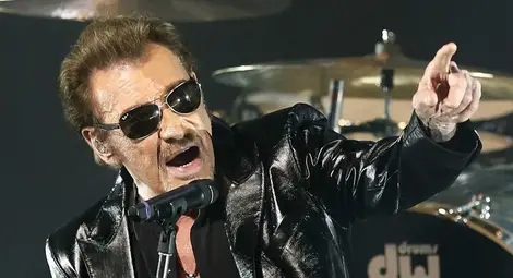 Почина Джони Холидей