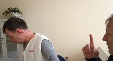 Стопкадър от скандалното видео на Ангелов. Стопкадър от скандалното видео на Ангелов.