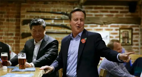 Дейвид Камерън и китайския президент Си Дзинпин на картофки с бира в лондонска кръчма