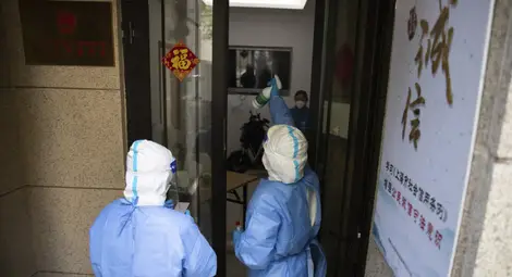 Китай продължава да регистрира по над 20 000 случая на COVID-19 на ден