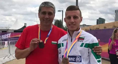 Християн с личния си треньор Евгени Игнатов.