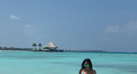 Глория и любимият ѝ там, където океанът и небето се сливат /галерия/